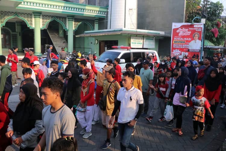 Lewat Jalan Sehat, OJK dan DPR RI Edukasi Bahaya Pinjol Ilegal dan Investasi Bodong 