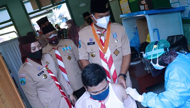 Dijadikan Penegak Prokes, Ratusan Anggota Pramuka Madiun Ikut Vaksinasi Covid-19