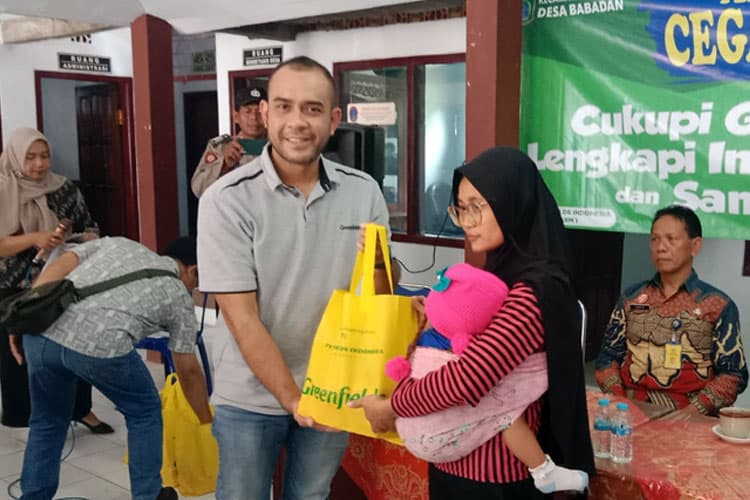 Greenfield Indonesia Salurkan Bantuan Nutrisi untuk Anak dan Ibu Menyusui di Ngajum