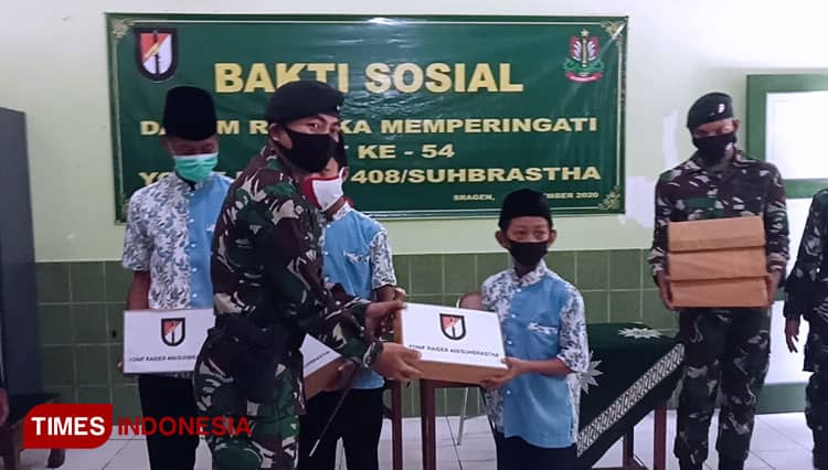 Peringati HUT ke-54, Yonif Raider 408/Suhbrastha Berbagi dengan Anak Yatim